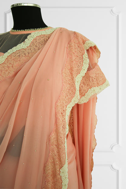 Peach Elegance Saree with Pearl and Lace Detailing