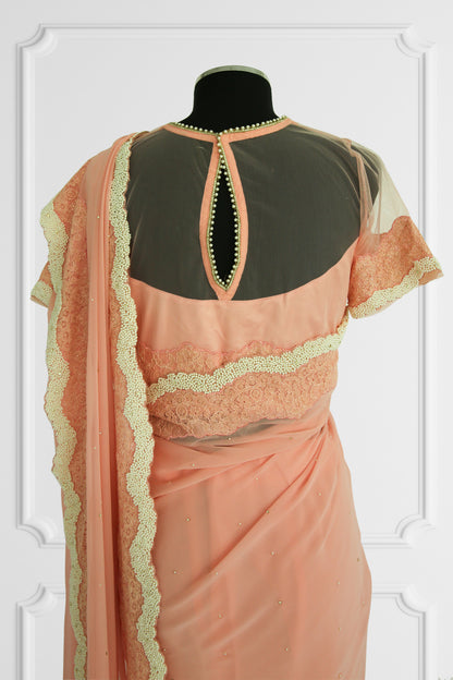 Peach Elegance Saree with Pearl and Lace Detailing