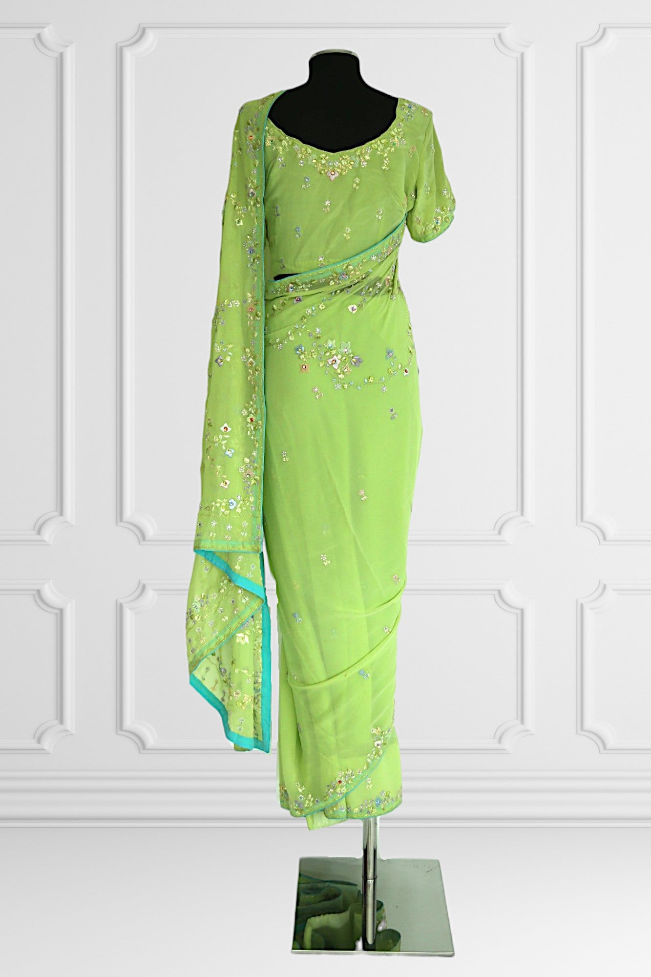 Green with delicate Floral Embroideries Saree Set