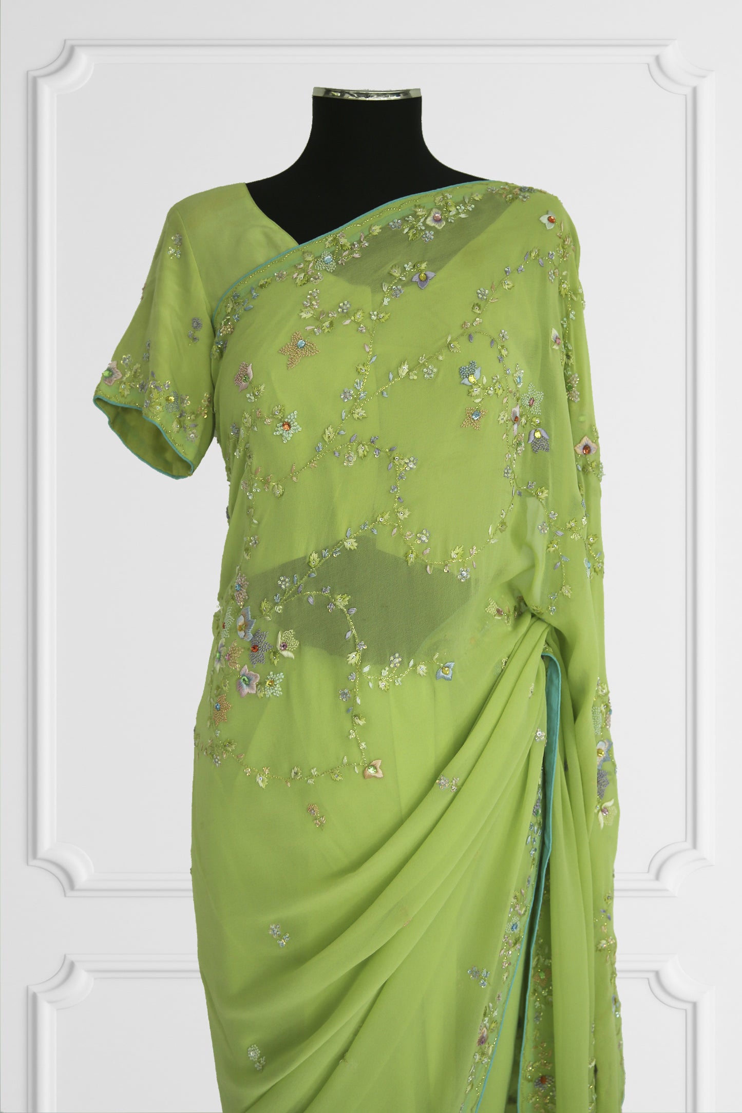 Green with delicate Floral Embroideries Saree Set