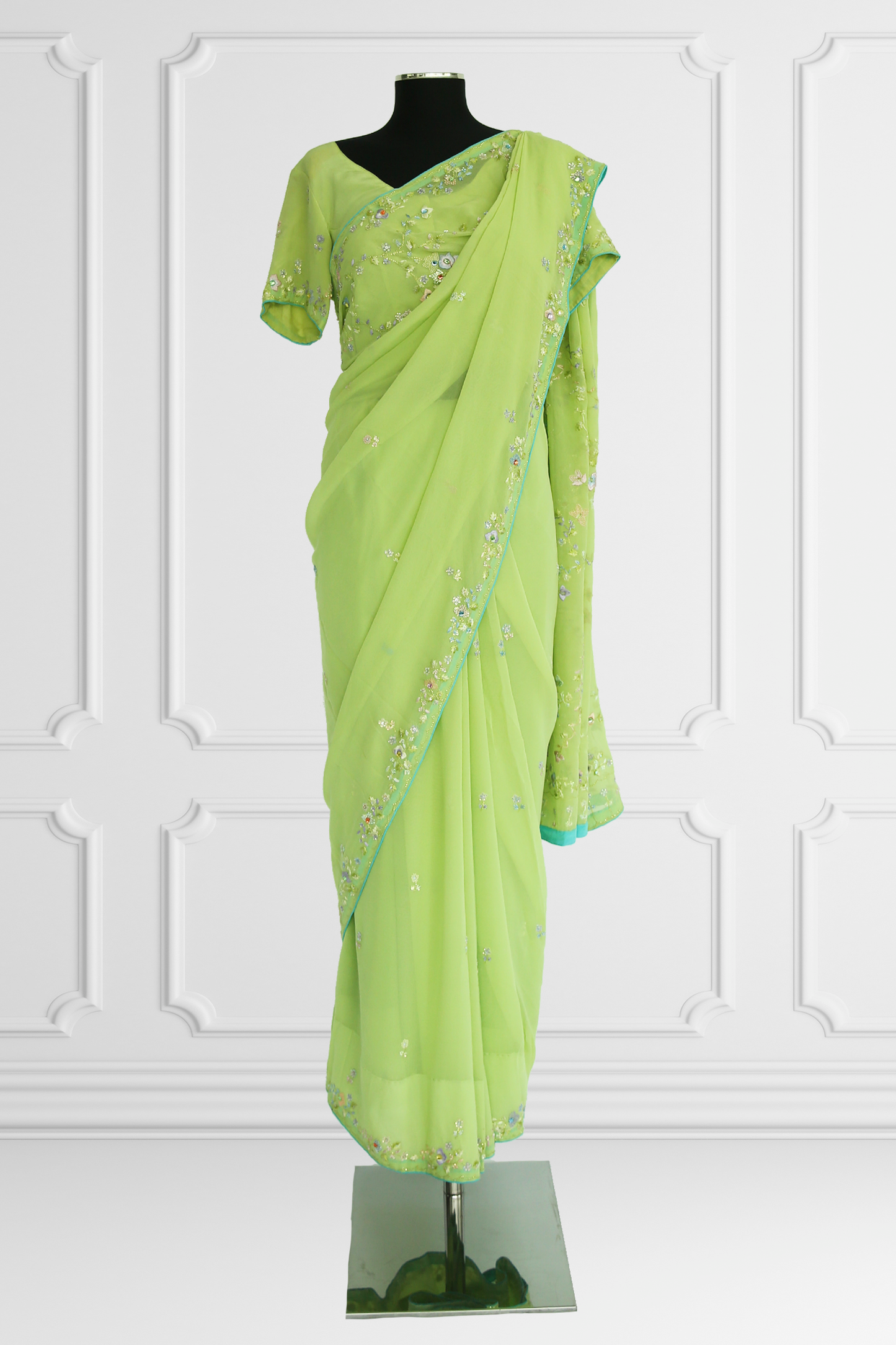 Green with delicate Floral Embroideries Saree Set