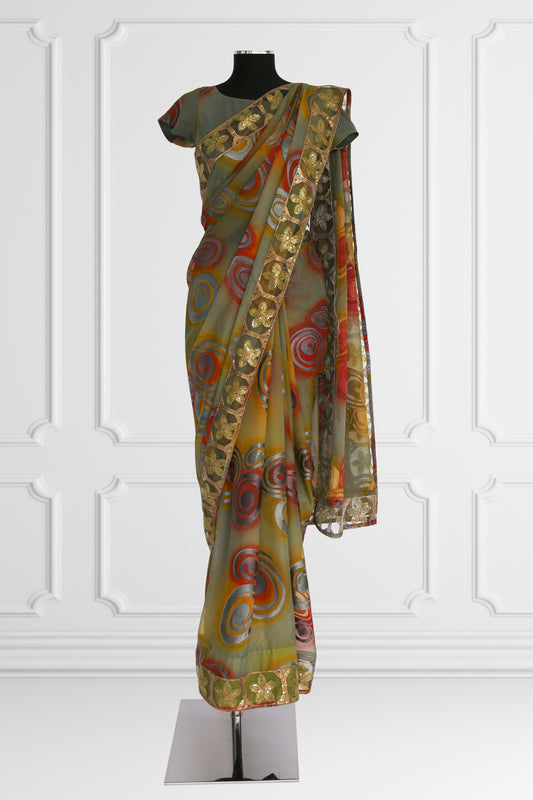 Olive Green Saree with Vibrant Swirls and Embroidered Gold Border