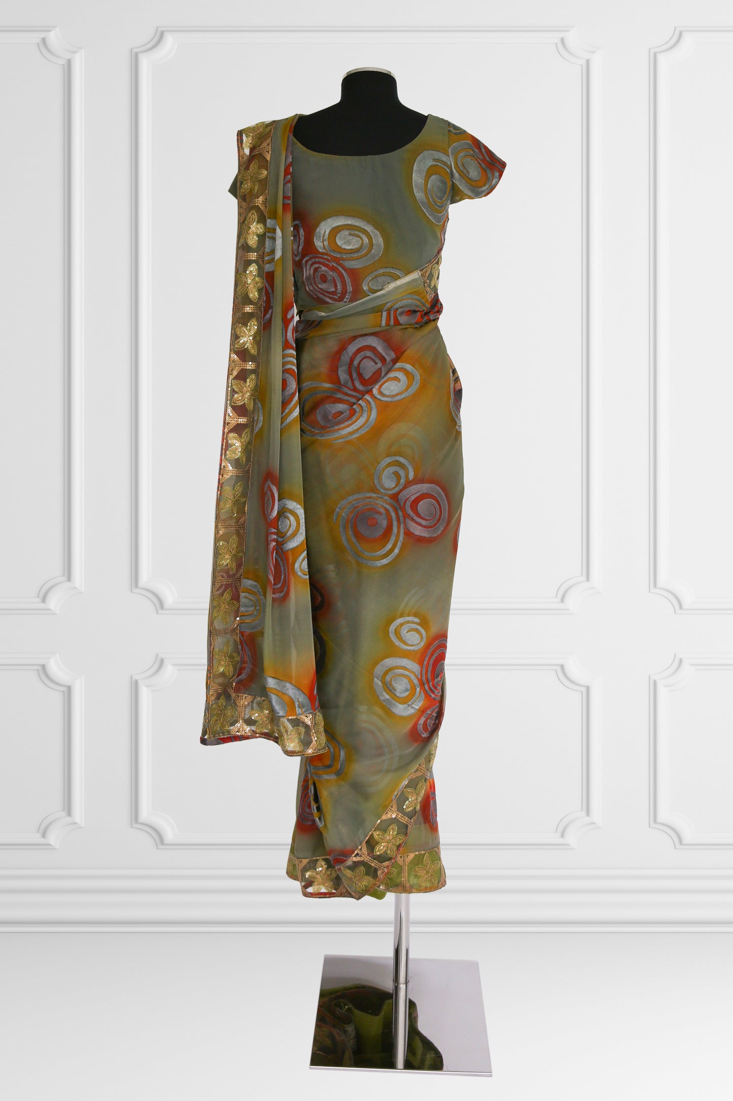 Olive Green Saree with Vibrant Swirls and Embroidered Gold Border